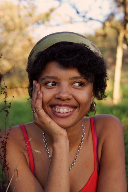 Headshot of Poppy Okotcha